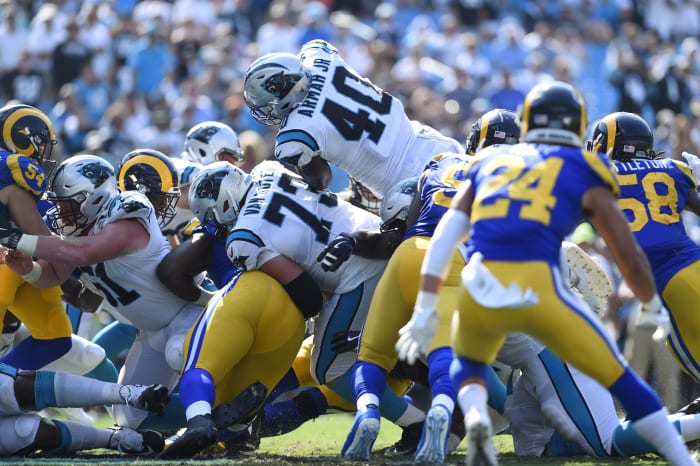 Carolina Panthers fullback Alex Armah (40) dives over the pile for a touchdown. Mandatory Credit: Bob Donnan-USA TODAY Sports